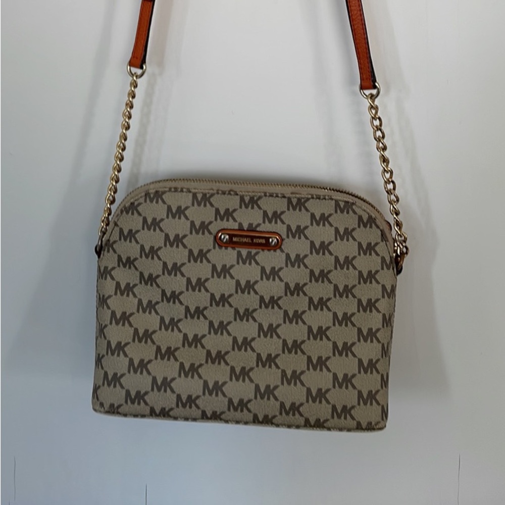Tan crossbody Michael Kors purse